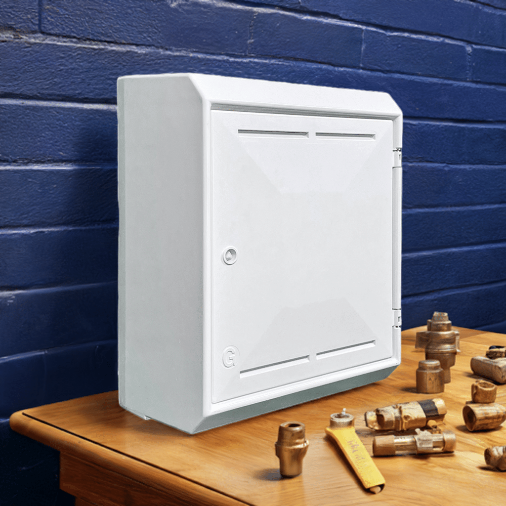 meter box with gas fittings around in on a desk